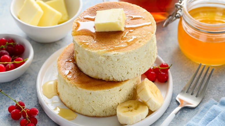 Japanese soufflé pancakes with butter and fruit