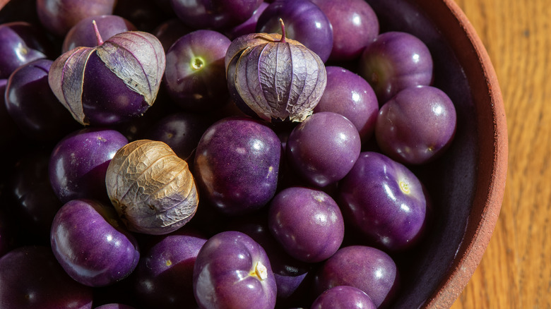 bowl of purple tomatillos