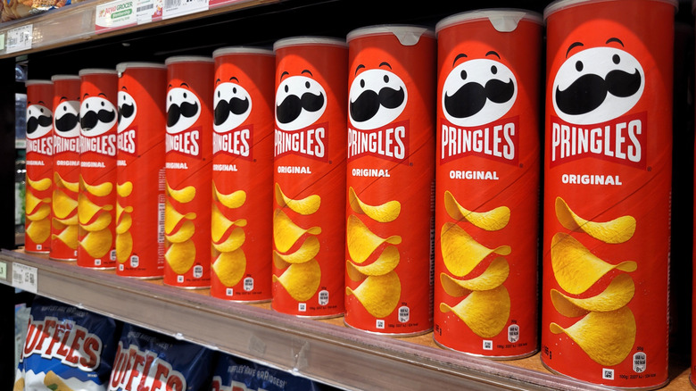 Pringles sold on a shelf.