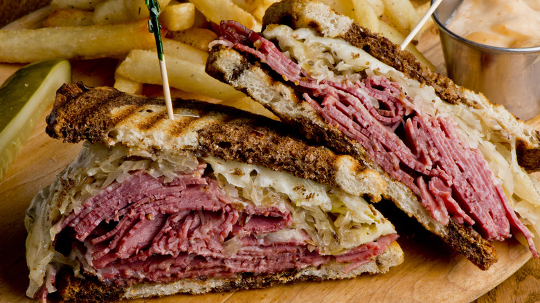 Reuben sandwich in front of French Fries
