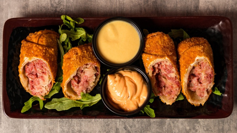 Reuben eggrolls with dipping sauces