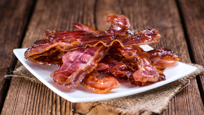 crispy bacon on a white plate
