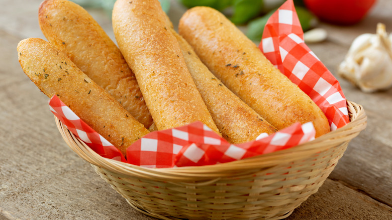 Wicker basket of breadsticks