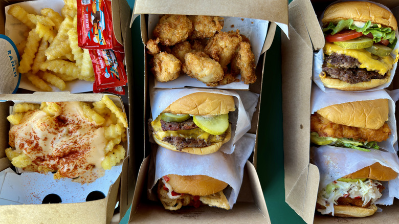 An assortment of burgers, fries, and chicken from Shake Shack.