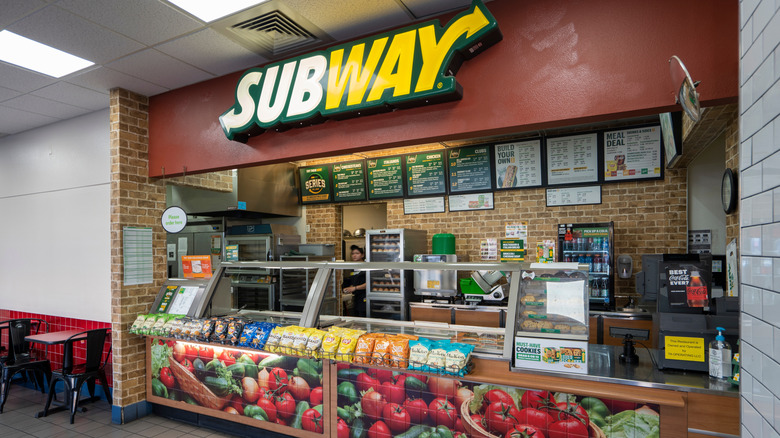 A Subway sandwich shop with counter