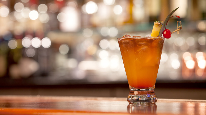 rum and pineapple on bar counter