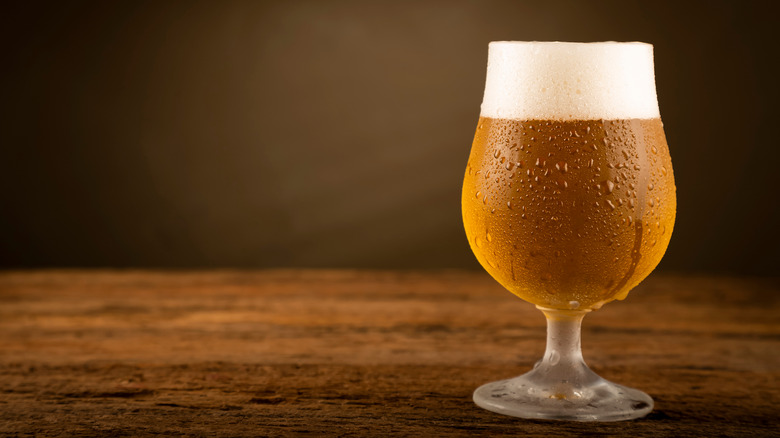 glass of beer with foam
