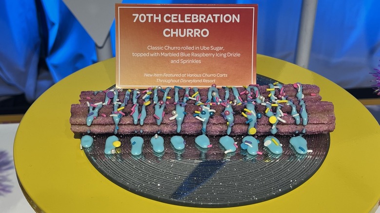 purple churro blue frosting sprinkles