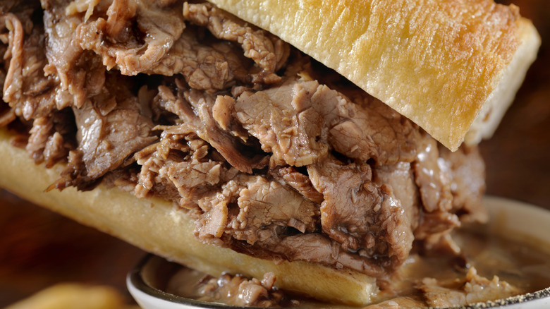 French beef dip sandwich dipped in au jus