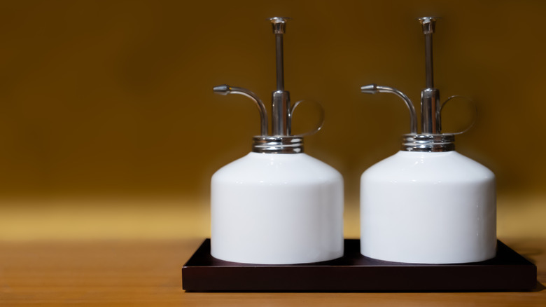White ceramic oil cruets