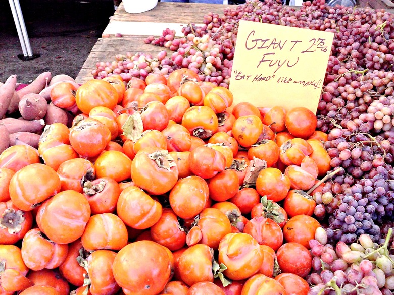 The orange, tomato-shaped persimmon is in season. Just make sure you get the correct variety.