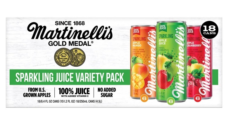 A variety pack of sparkling juices sits on a white background.