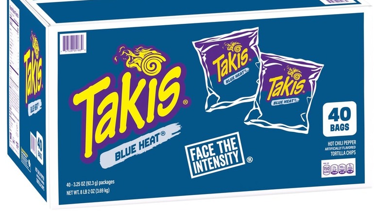 A box of Takis Blue Heat chips sits against a white background.