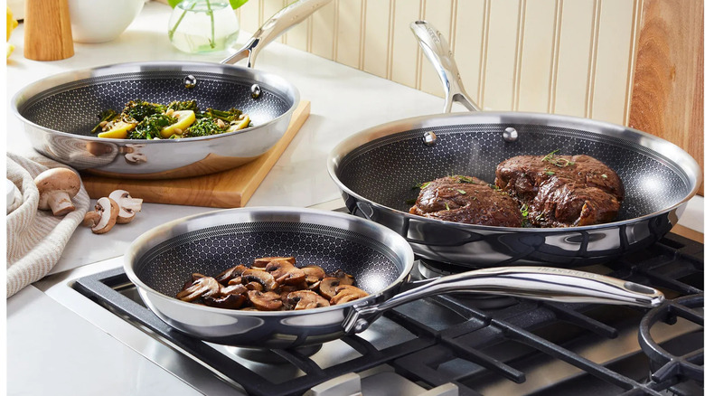 Henckels pans from Costco cooking food on stovetop