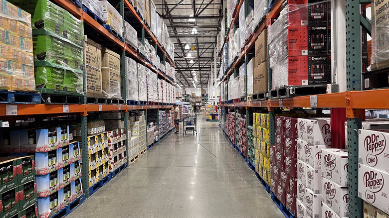 Shoppers exit a Costco store.
