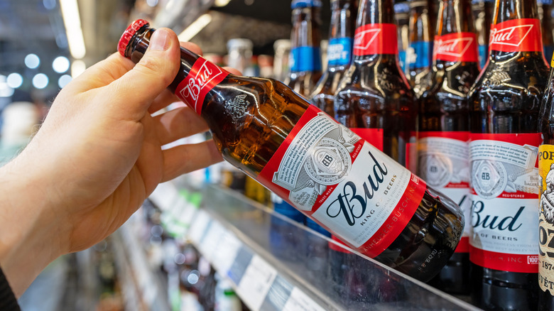 Budweiser beer grabbed off of shelf