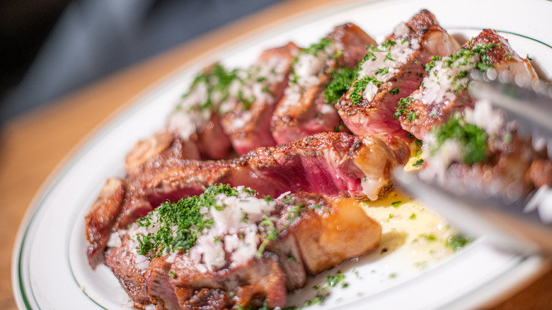 Plate of medium rare steak