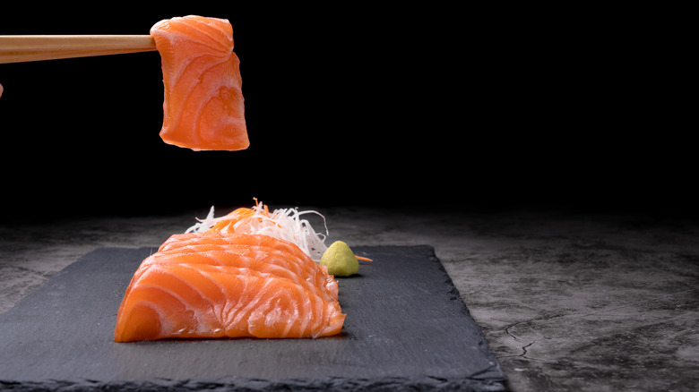 using chopsticks for Japanese sashimi