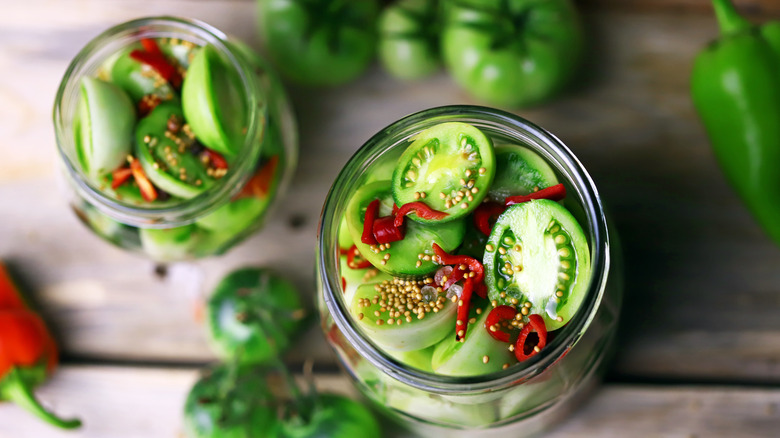 sliced pickled green tomatoes with spices