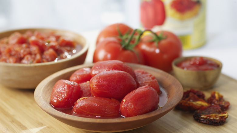 a bowl of canned tomatoes 