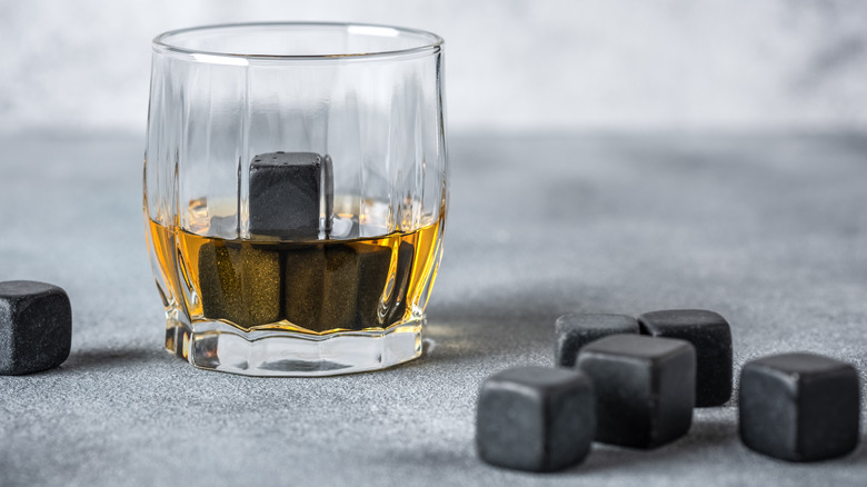 Glass of whiskey with whiskey stones