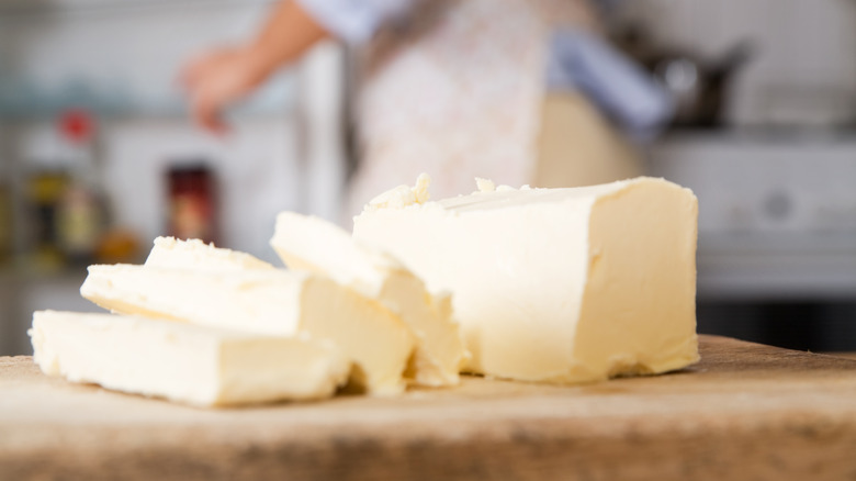 big slab of butter with slices