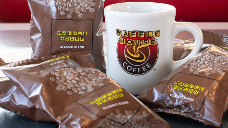 Bag of Waffle House Classic Blend ground coffee next to a Waffle House mug