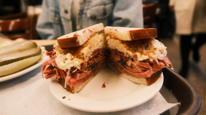 Katz deli Reuben on a white plate