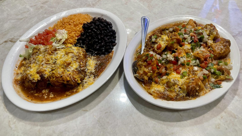 Plate of Los Dos Potrillos chili rellenos with rice and beans alongside an order of chili relleno nachos
