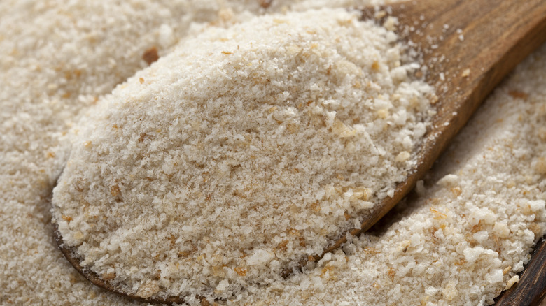 wooden spoon with bread crumbs