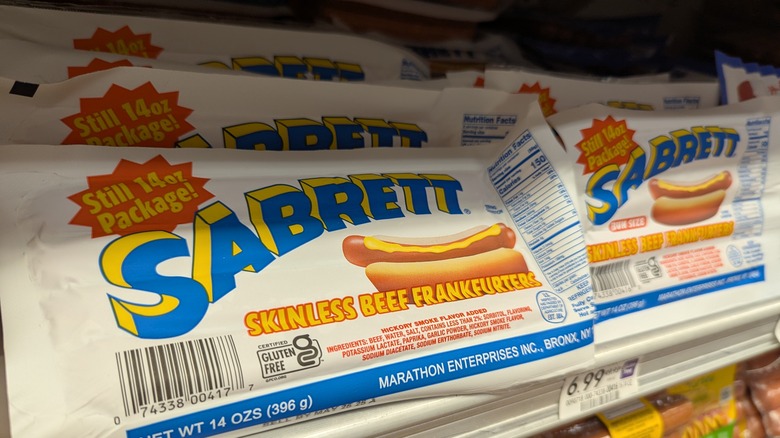 Packages of Sabrett Skinless Beef Frankfurters on a market shelf