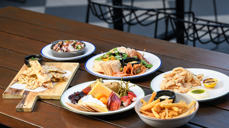 Various appetizers on a wooden table