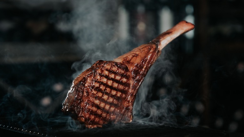 Tomahawk steak on grill