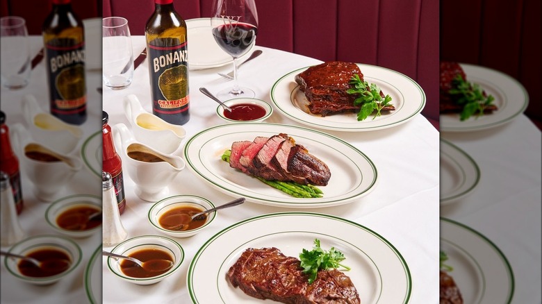 Steak and wine on table