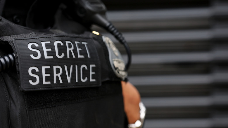 close-up of secret service badge on an officer's uniform