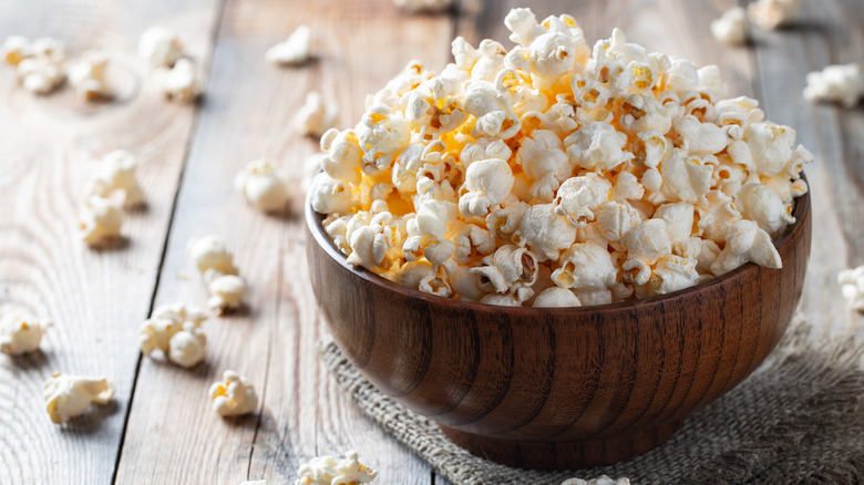 bowl of popcorn on wooden table