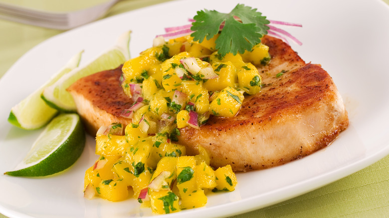 Grilled swordfish with tropical mango salsa, limes, cilantro
