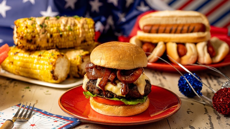 hamburgers, hot dogs, and corn cobs