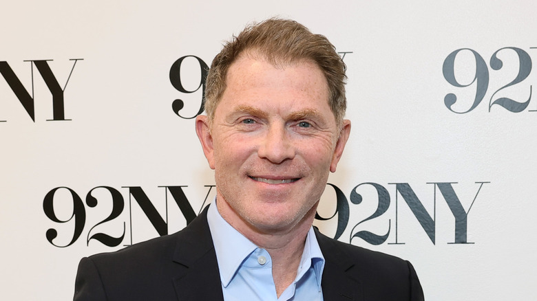 Bobby Flay smiling at a 92NY event