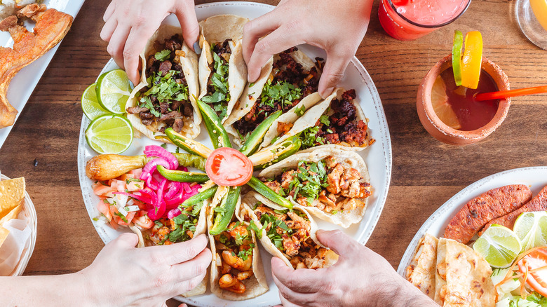 Family-style meal with tacos