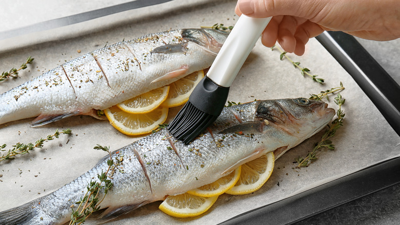 Raw fish being prepared to cook