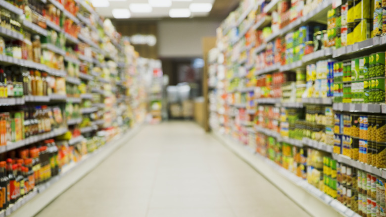 Rows of canned food at the grocery store