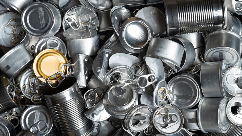 Pile of cans with grooved and straight sides