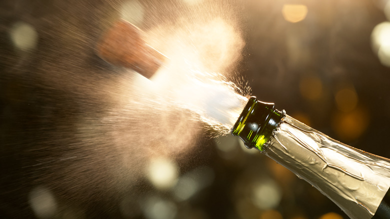 Champagne cloud as cork popped