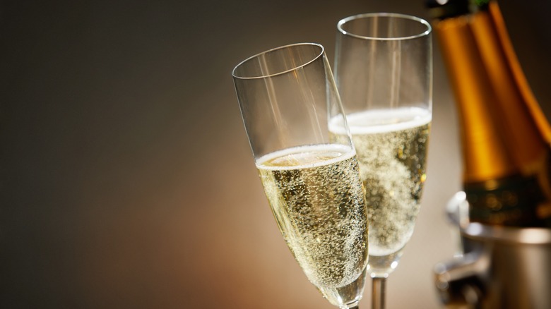 effervescent Champagne in flutes 