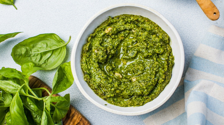 Pesto in a white bowl.