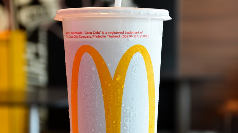 Closeup of a McDonald's soda cup with condensation on its exterior