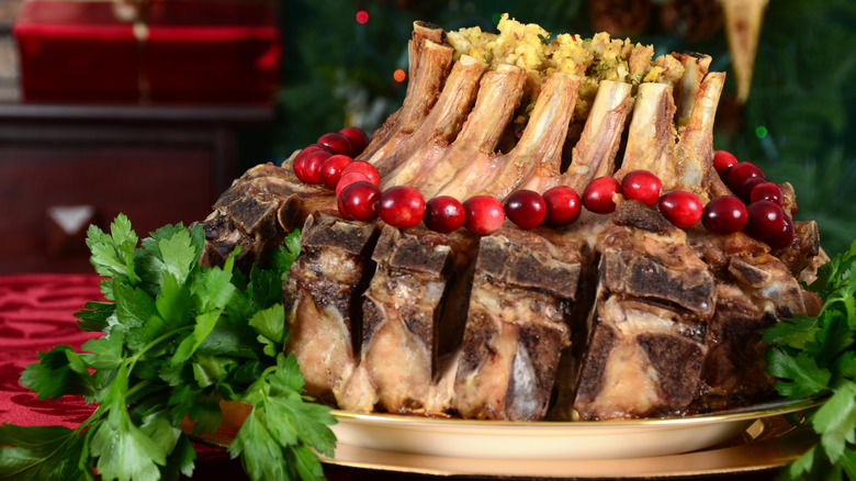A festively decorated crown roast of pork