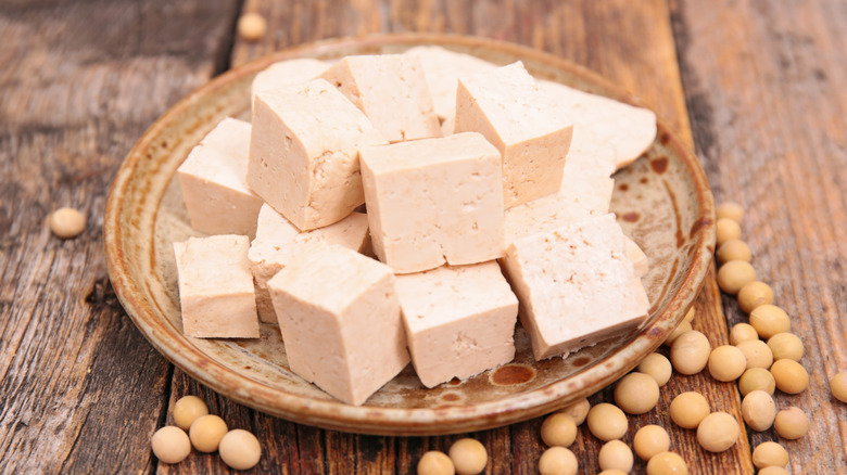 A bowl of tofu cubes.