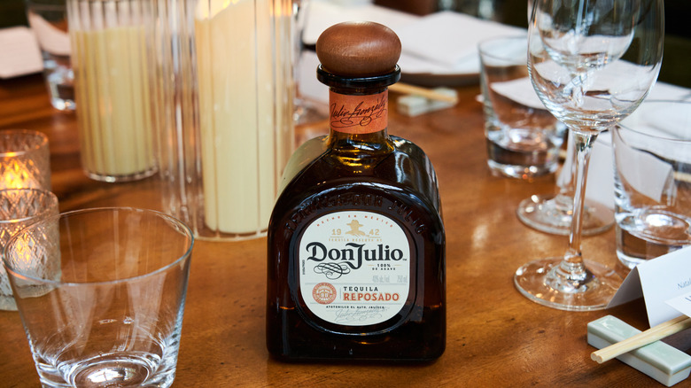 Bottle of Don Julio 1942 on dinner table